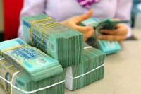 Tăng thu ngân sách, giảm khoản giữ lại : vắt kiệt Thành phố Hồ Chí Minh